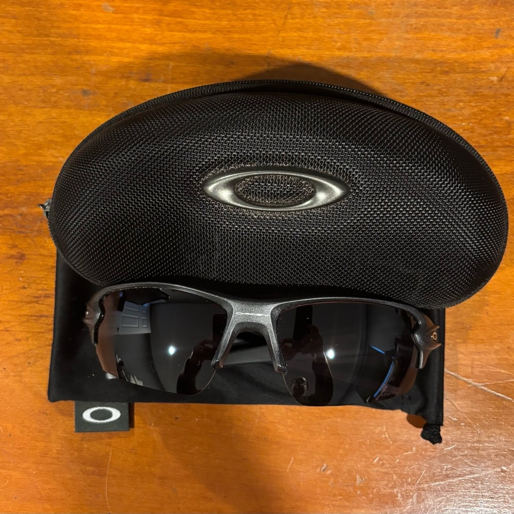 Oakley Dark Gray Sunglasses with Black Case
